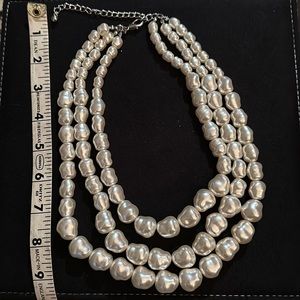 Chicos three strand pearl necklace.